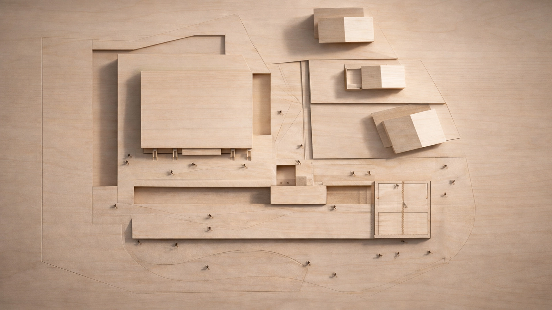 Plastico di studio in legno del complesso scolastico di Rablà: analisi volumetrica del progetto.